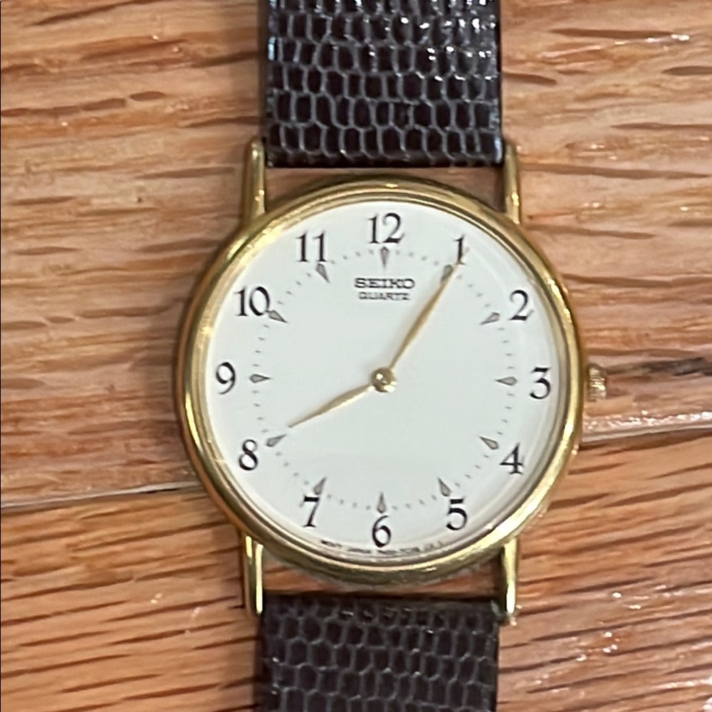 Seiko Gold Case with Black Strap Watch